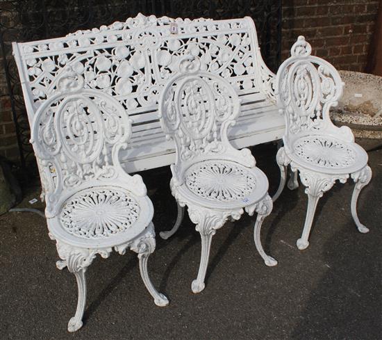 Set of three Victorian cast iron garden chairs and a similar bench